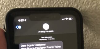 Πραγματική φωτογραφία μηνύματος SMS phishing σε κινητό τηλέφωνο